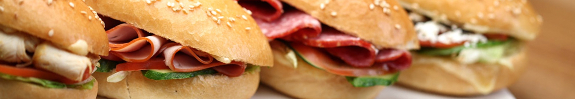Eating Pizza Sandwich at Robbie Mac's Pizzeria & Eatery restaurant in Sherman Oaks, CA.